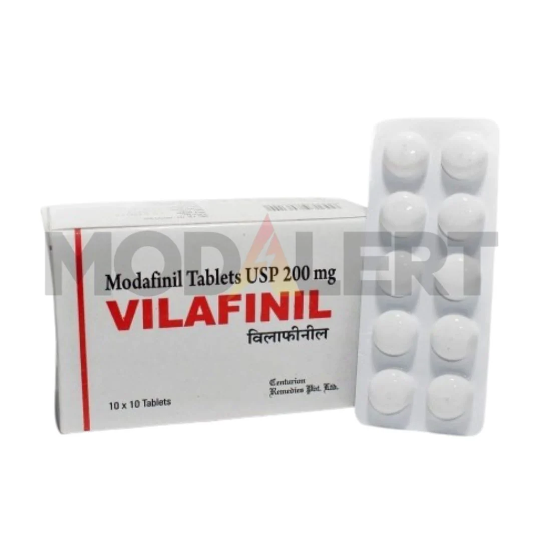 Vilafinil UK product image showing Vilafinil 200mg Modafinil carton with red lettering beside a white blister of round tablets